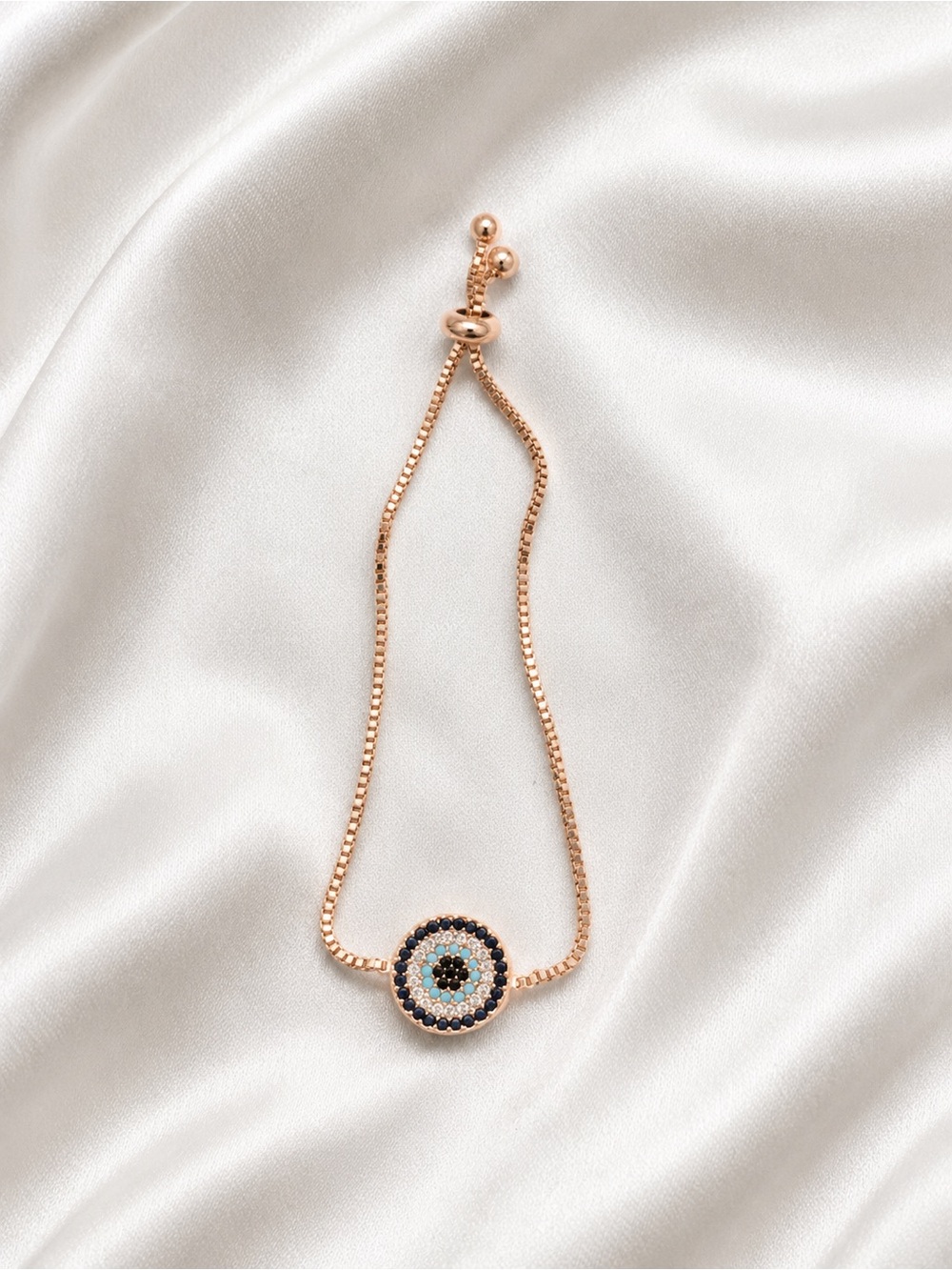 Rose Gold Evil Eye Slider Bracelet with Blue and Black Accents